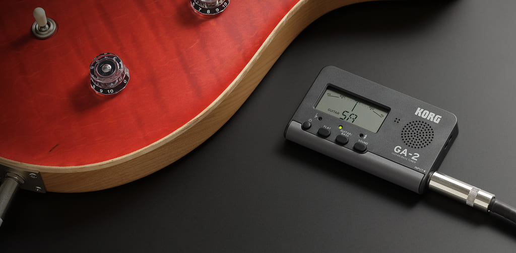 afinador con entrada mini jack para guitarra eléctrica y bajos